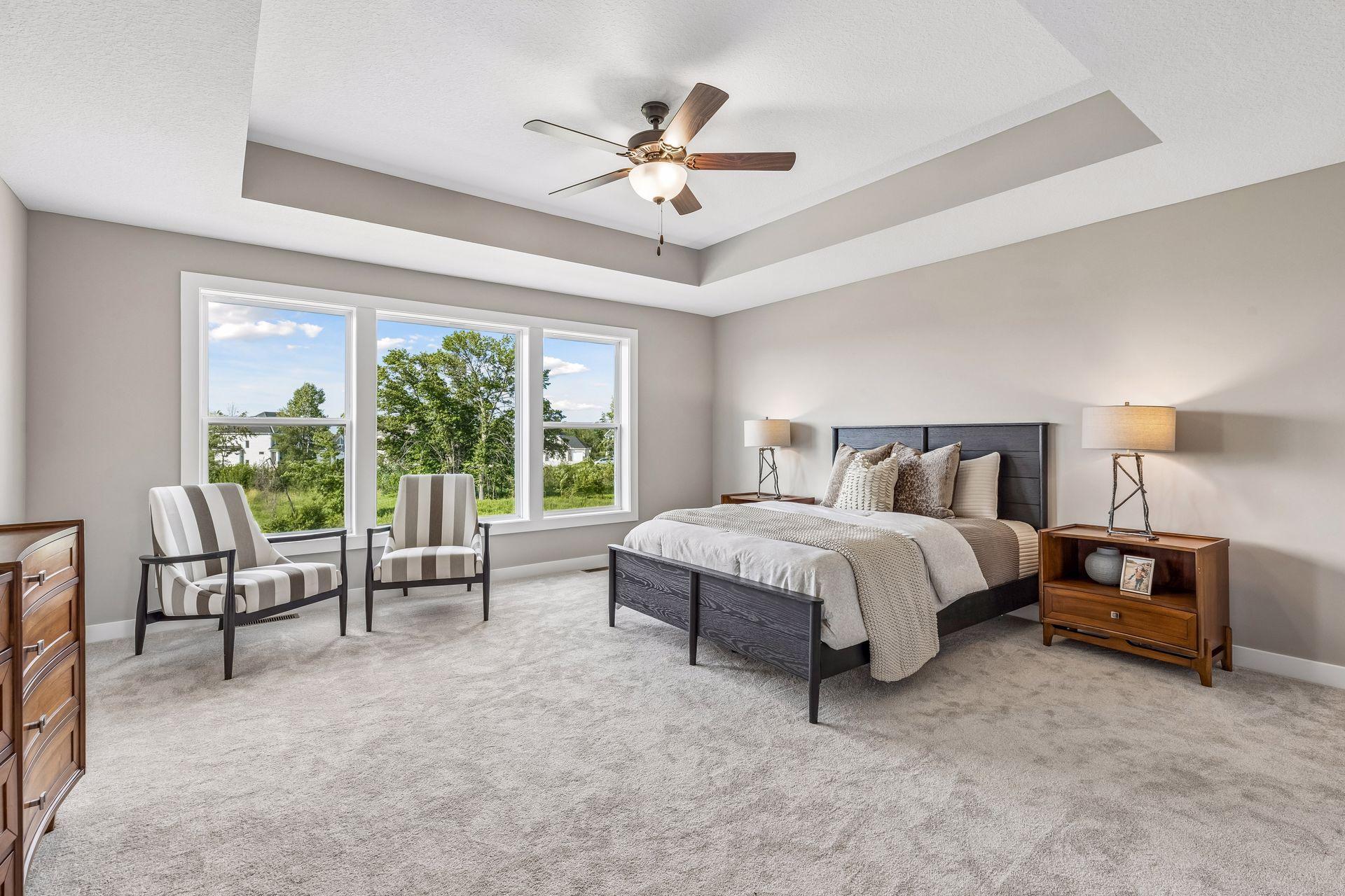 Open the grand French doors into your very own owner's suite with a private bath.