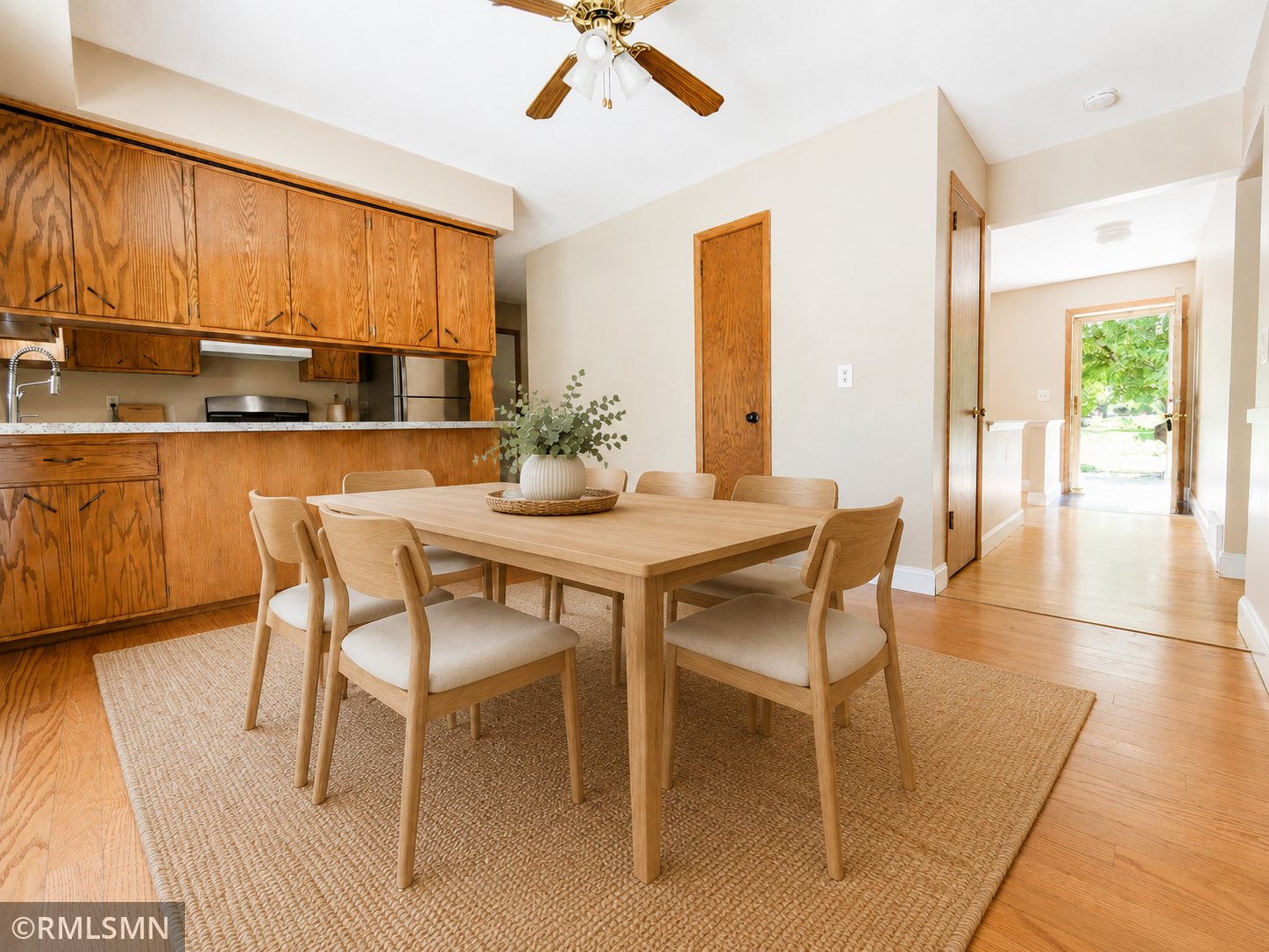 #15-Irving-Warm dining Room with view of hallway and front door.png