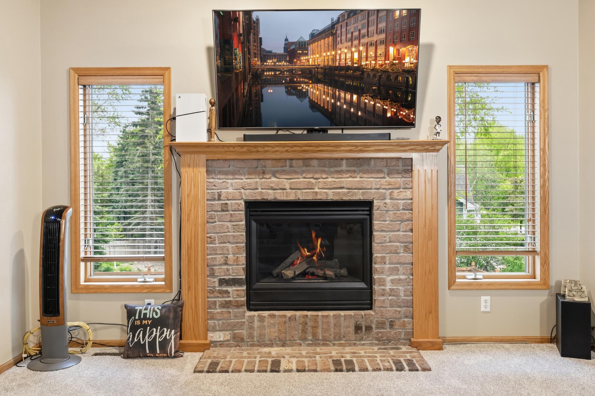 A closer look of the fireplace in the main level family room.