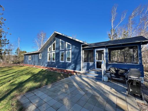 Lakeside view of home and patio off screen prouch.jpg