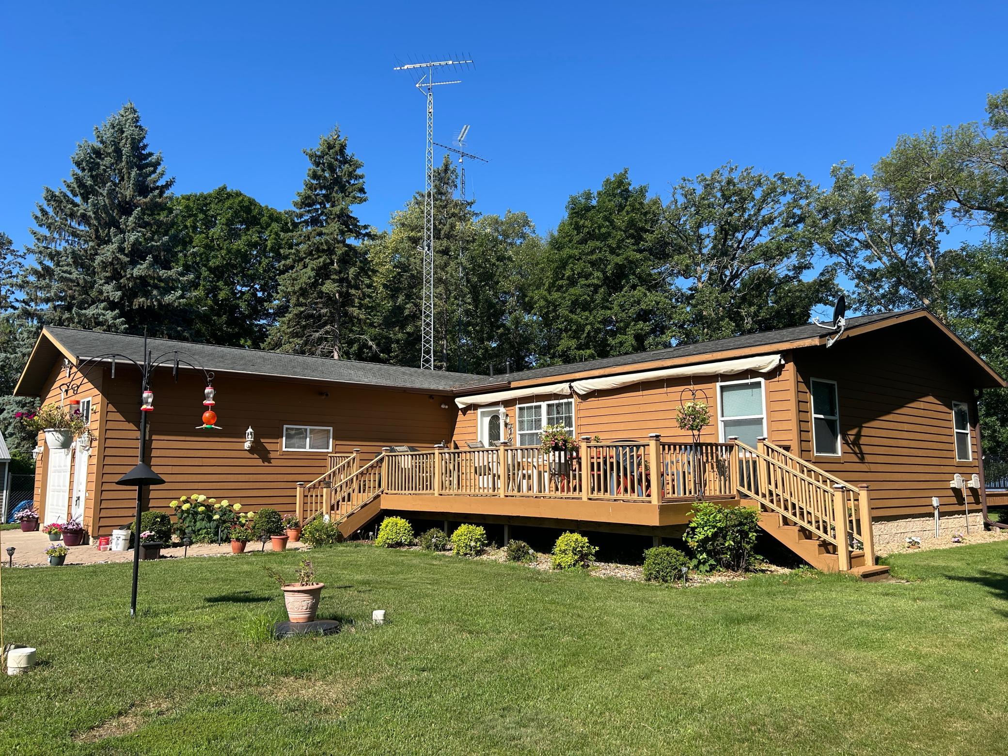 A shot of the home's exterior. Cedar siding, attached garage with Wirsbo heat and front and back decks for relaxing!