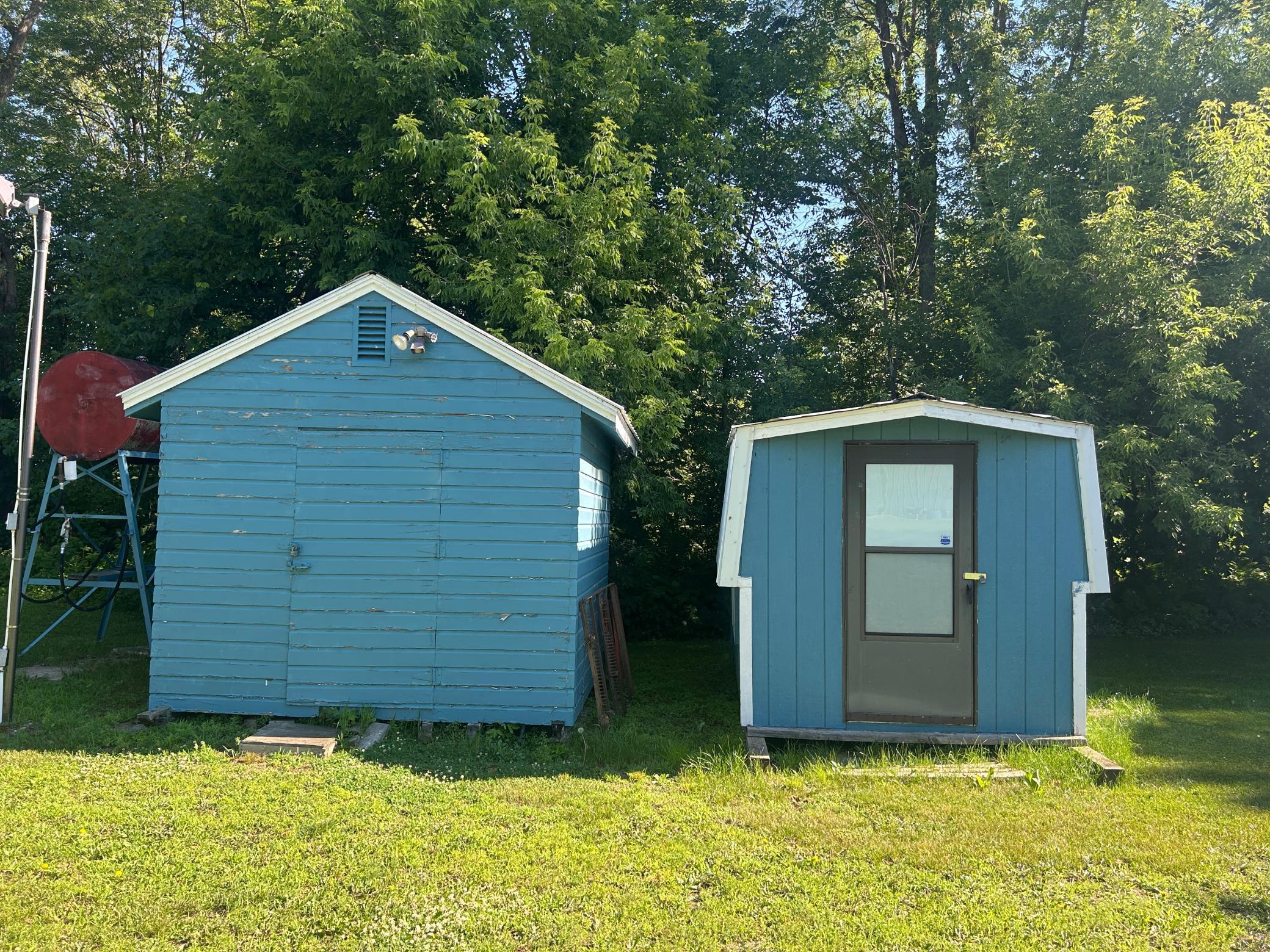 A shot of the side by side storage sheds.