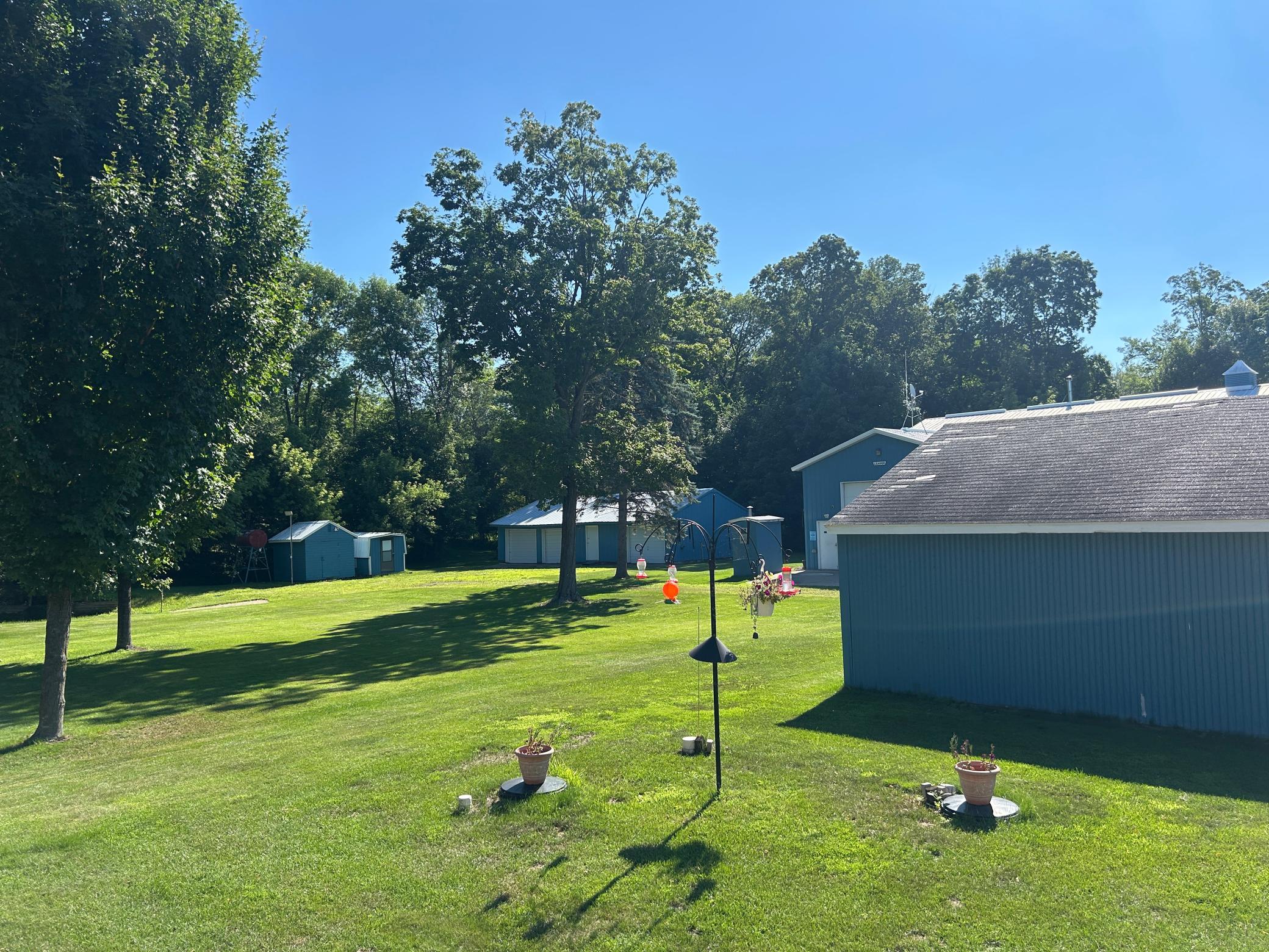 Views of the garages and sheds and pole barn.