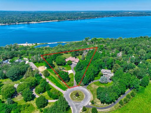 Shared association ownership of ~785 ft of sandy St. Croix River frontage w/a private beach, dock, & a walking trail, along w/35 acres of wooded & prairie land, surrounded by more than 200 acres of protected Carpenter Nature Center preserve.