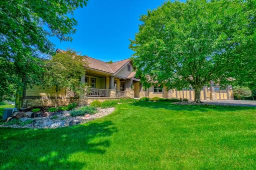 Finished attached & heated 3-car garage, additional detached 3-car garage, and 50-amp service in both garages for electric vehicle charging complete the property.