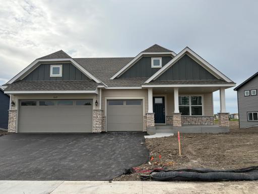 Welcome to 7449 Lotus Ln! (Photo is of the actual home in progress.)