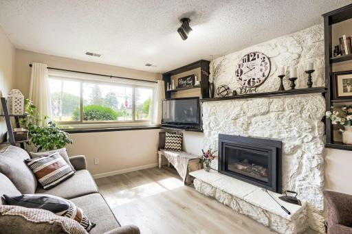 Lower level family room with large windows for natural light.