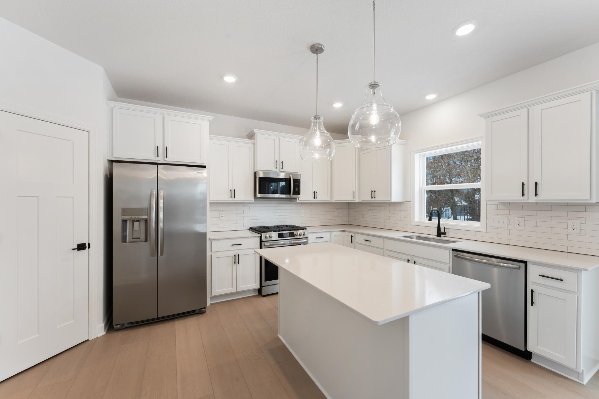 (Photo of a similar home, actual finishes may vary)
