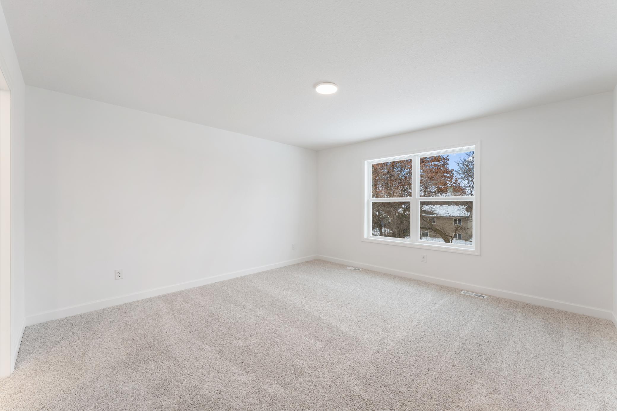 (Photo of a similar home, actual finishes may vary)