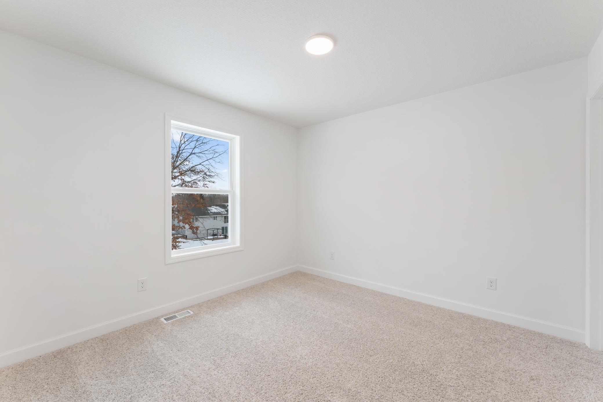 (Photo of a similar home, actual finishes may vary)
