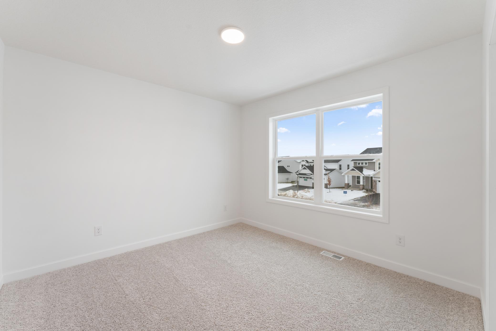 (Photo of a similar home, actual finishes may vary)