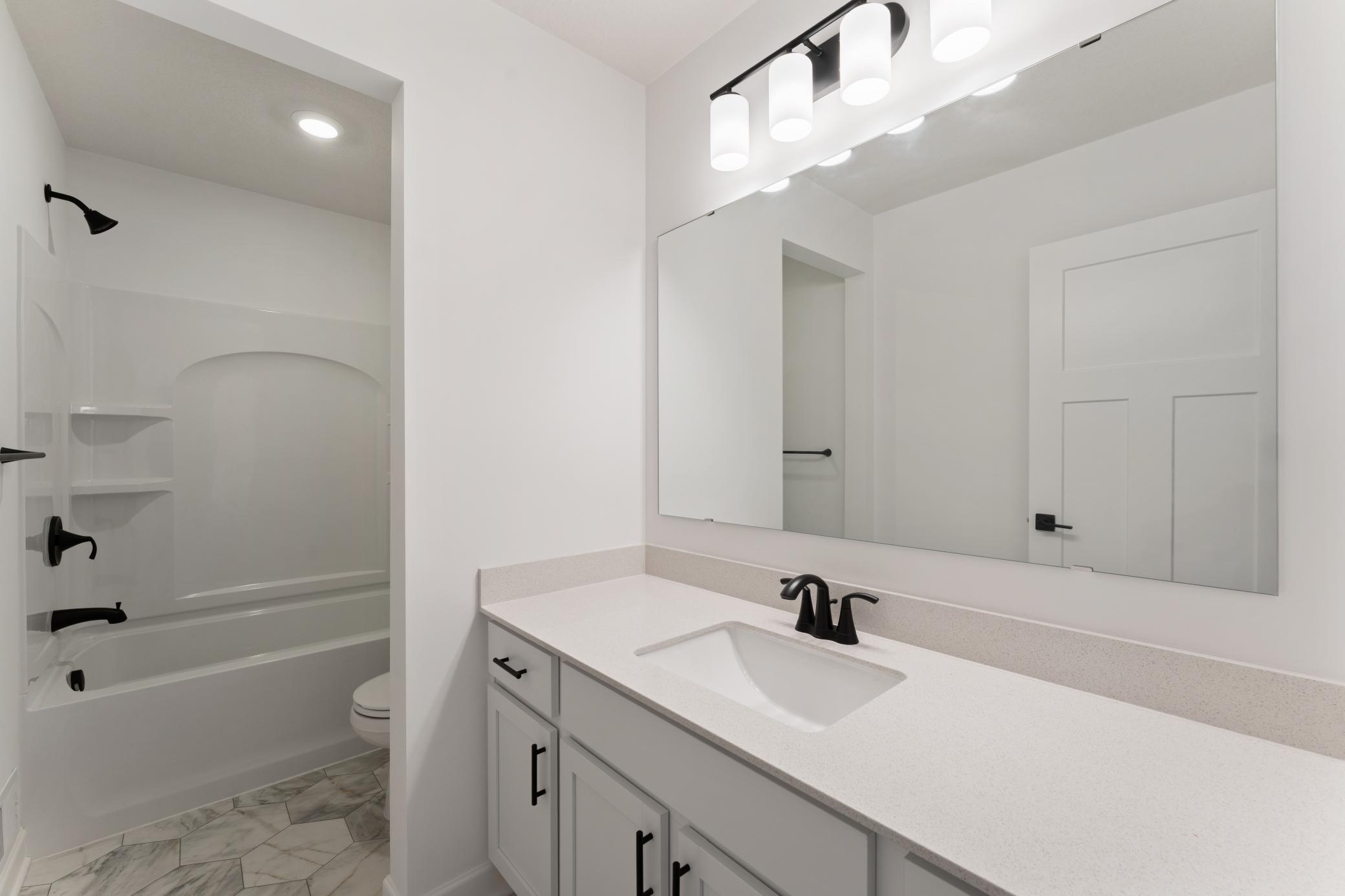 (Photo of a similar home, actual finishes may vary)