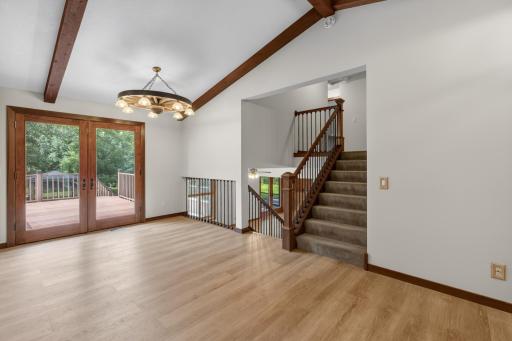 The dining area is perfect to extend for those extra large events. Walk right out onto your expansive deck and bask in the beauty and tranquility of your new back yard sanctuary.