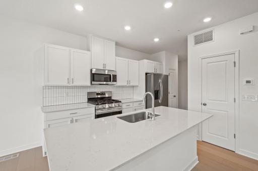 (All the following photos are of a similar home, actual finishes may vary.)