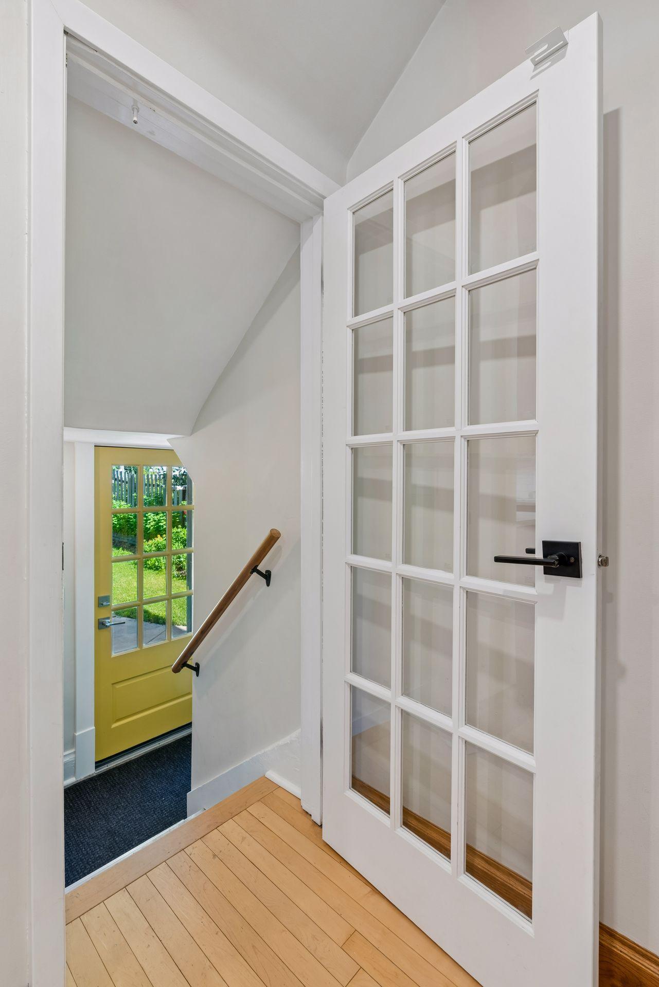 The new French door to the basement (back door, also new)