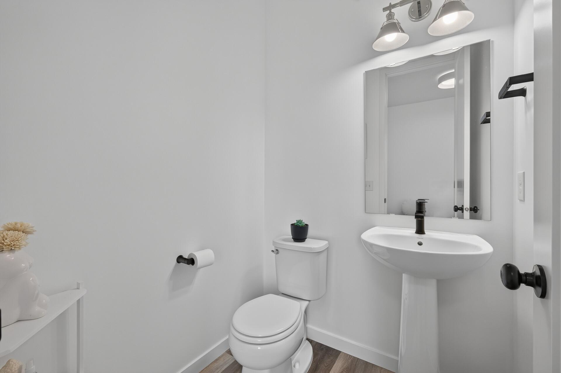 Clean and bright main floor powder bathroom