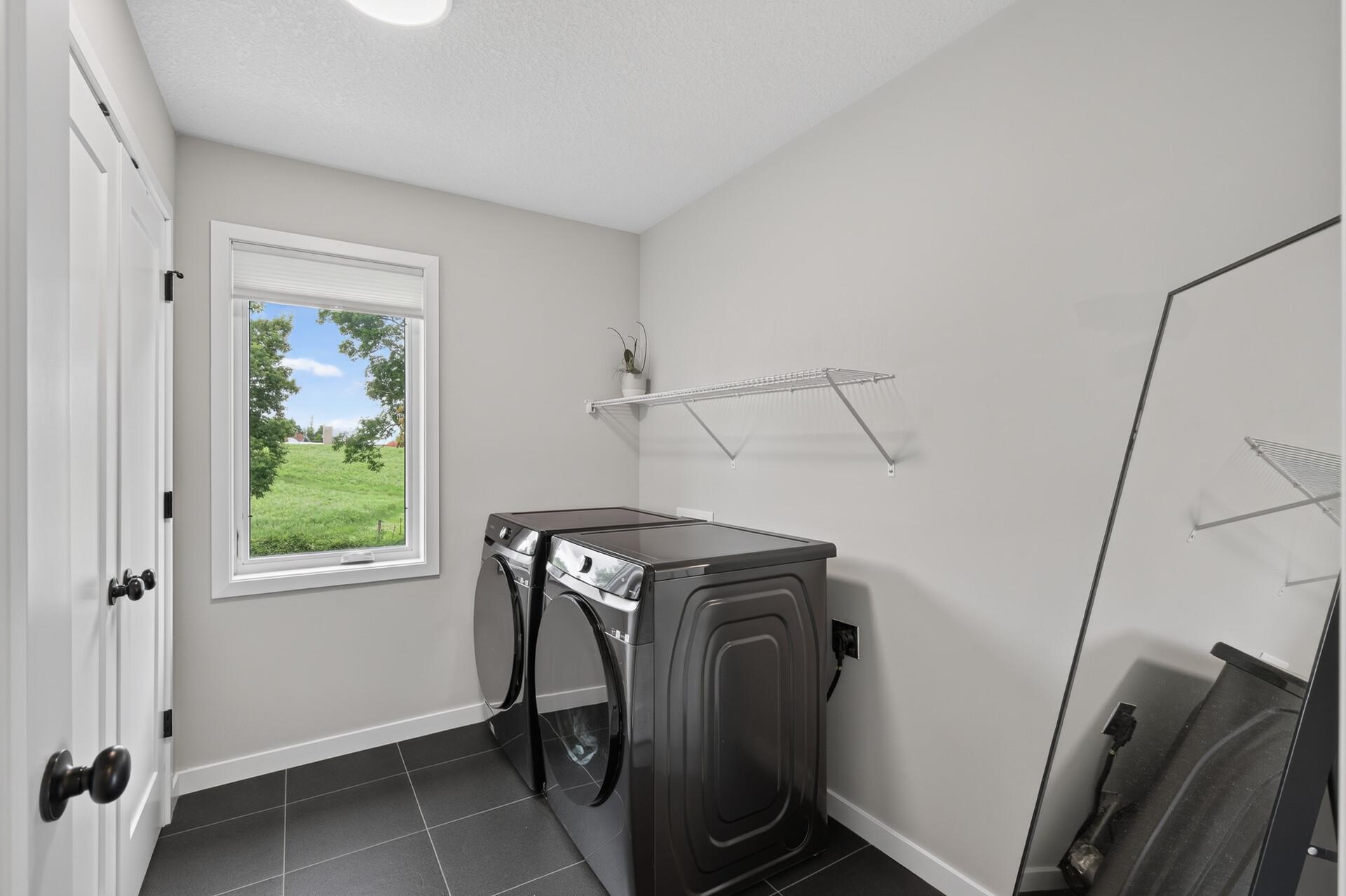 2nd floor laundry and nice storage closet