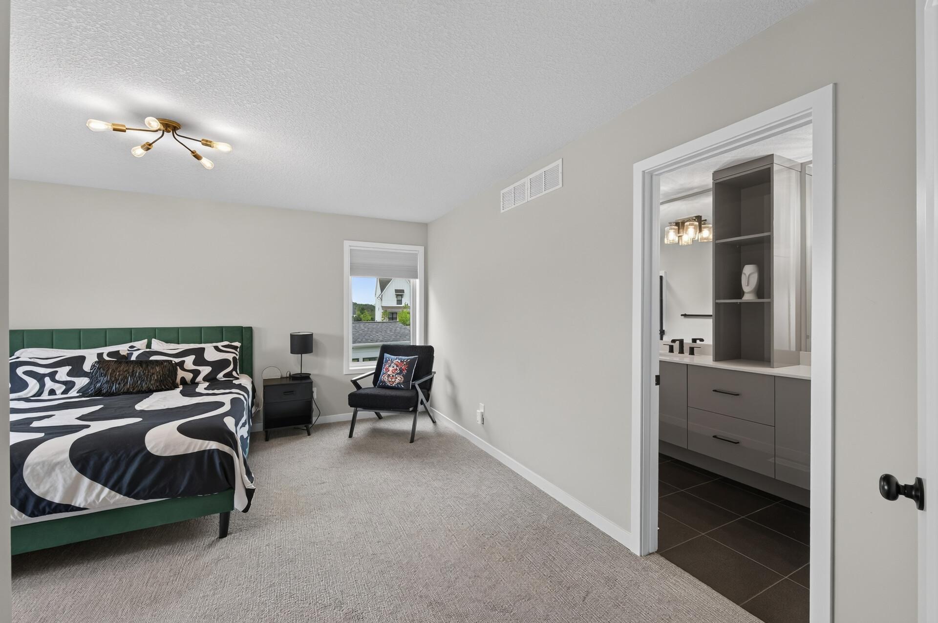 Another angle of primary bedroom