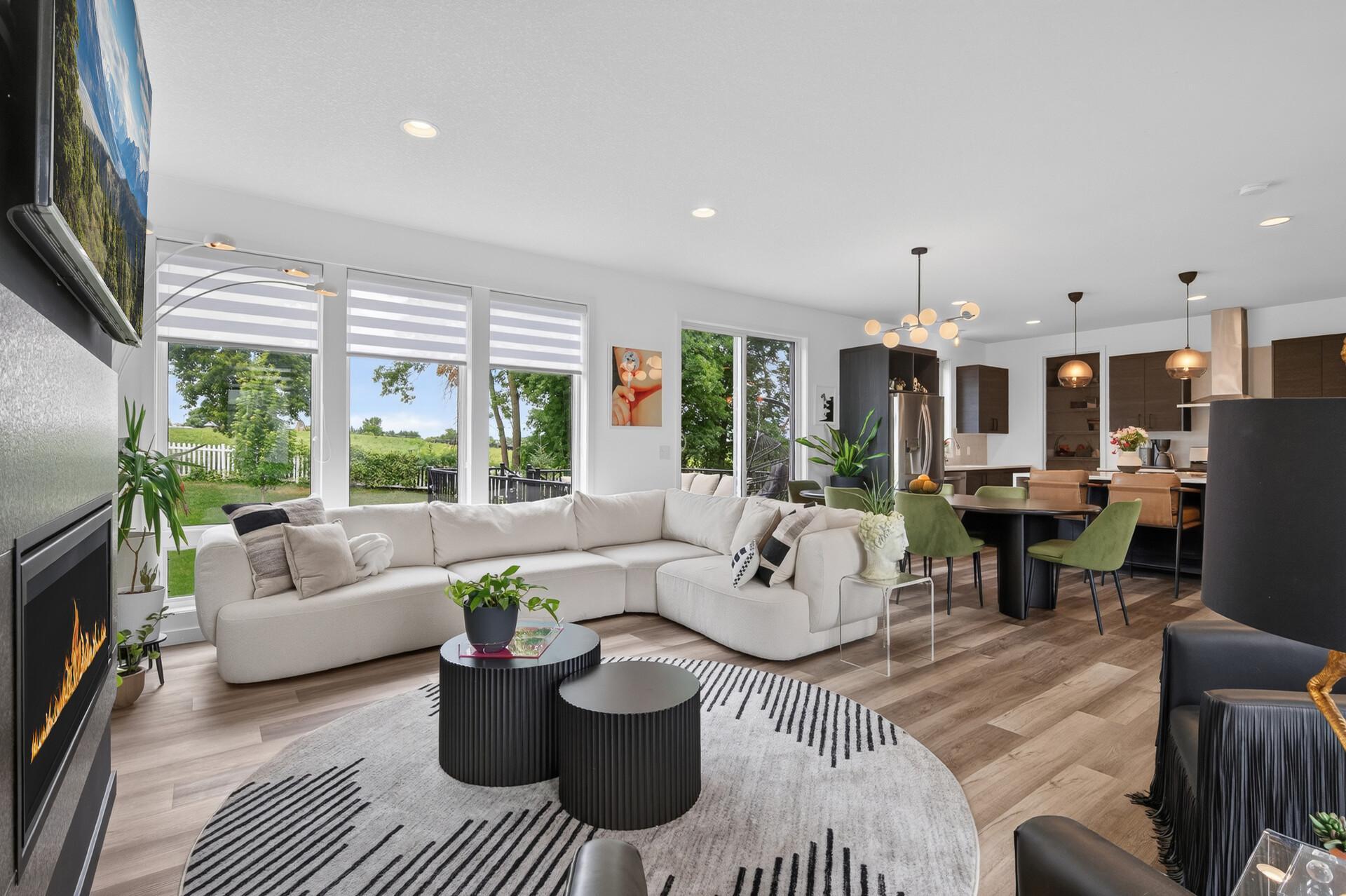 The open main floor is wonderful for entertaining or relaxing family time by the fireplace or sit out on your deck and watch the cows go by:-)