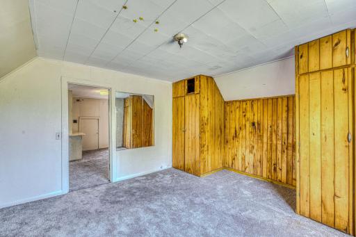 This bedroom offers gorgeous built-ins for all your storage needs.