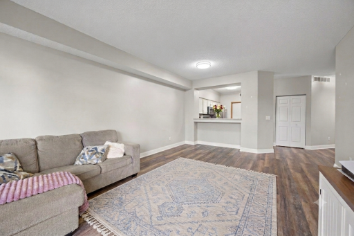 Beautiful main level LVP flooring, modern colors, white trim and doors. (Virtual staging has been used to help highlight its features).