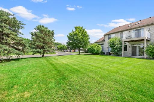 Overlooking expansive grassy area.