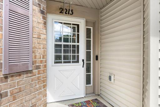 Welcome one to one-level living townhome in a highly desirable Eagan location offering peaceful backyard views overlooking expansive green space.