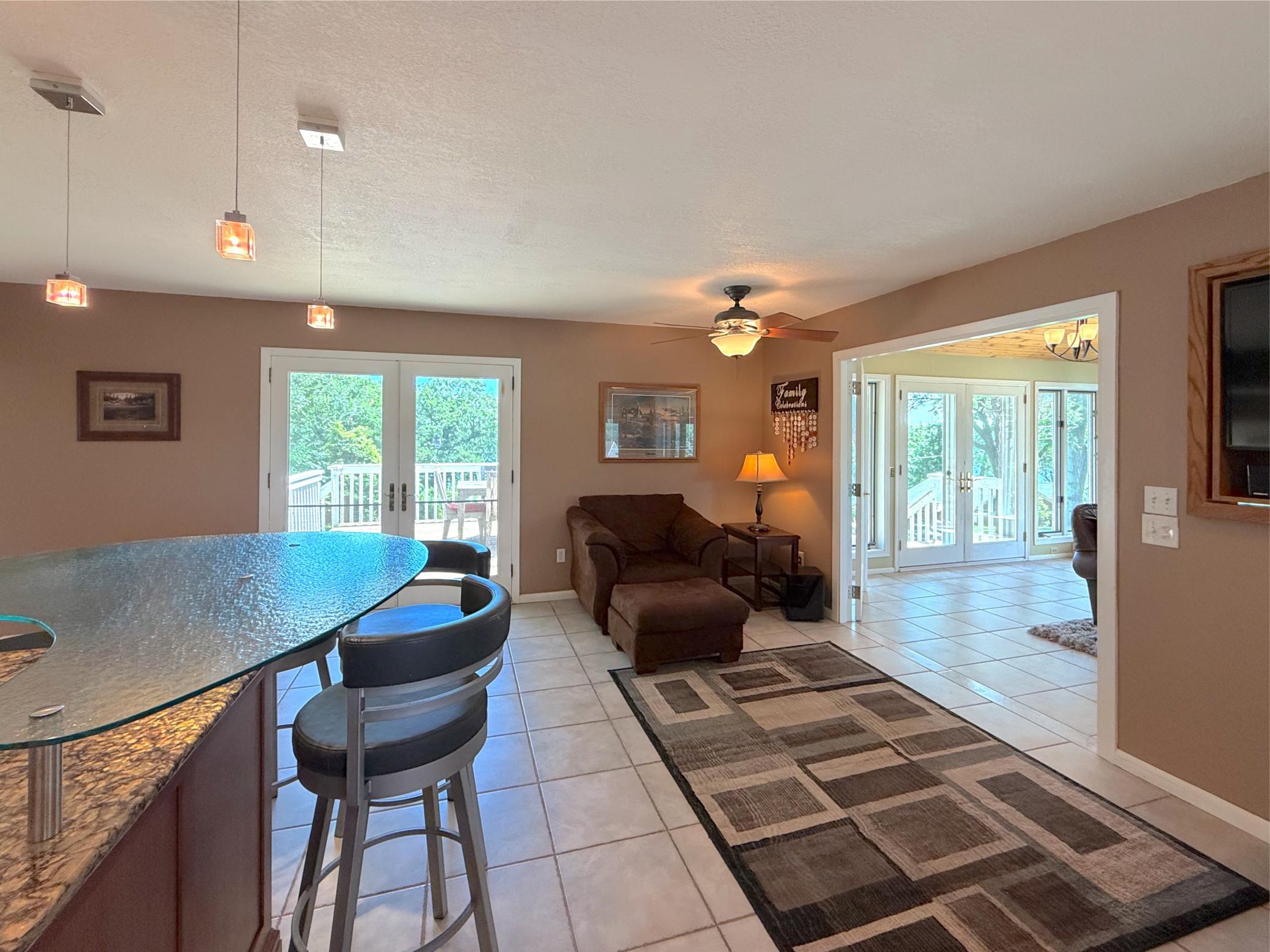 A convenient door leading directly to the lakeside deck is ideal whether your grilling dinner or enjoying coffee with a view of Lake Sylvia.
