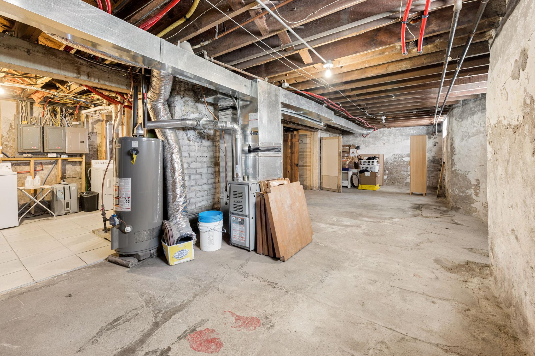 Basement storage space. First floor uses forced-air furnace and second/third floors are on radiant heat.