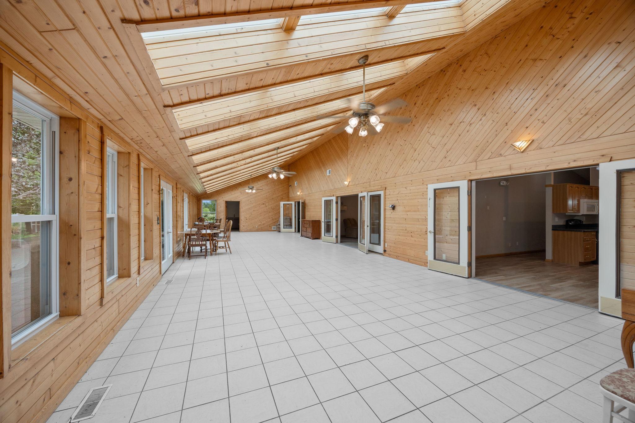 Sunroom has 5 French doors!