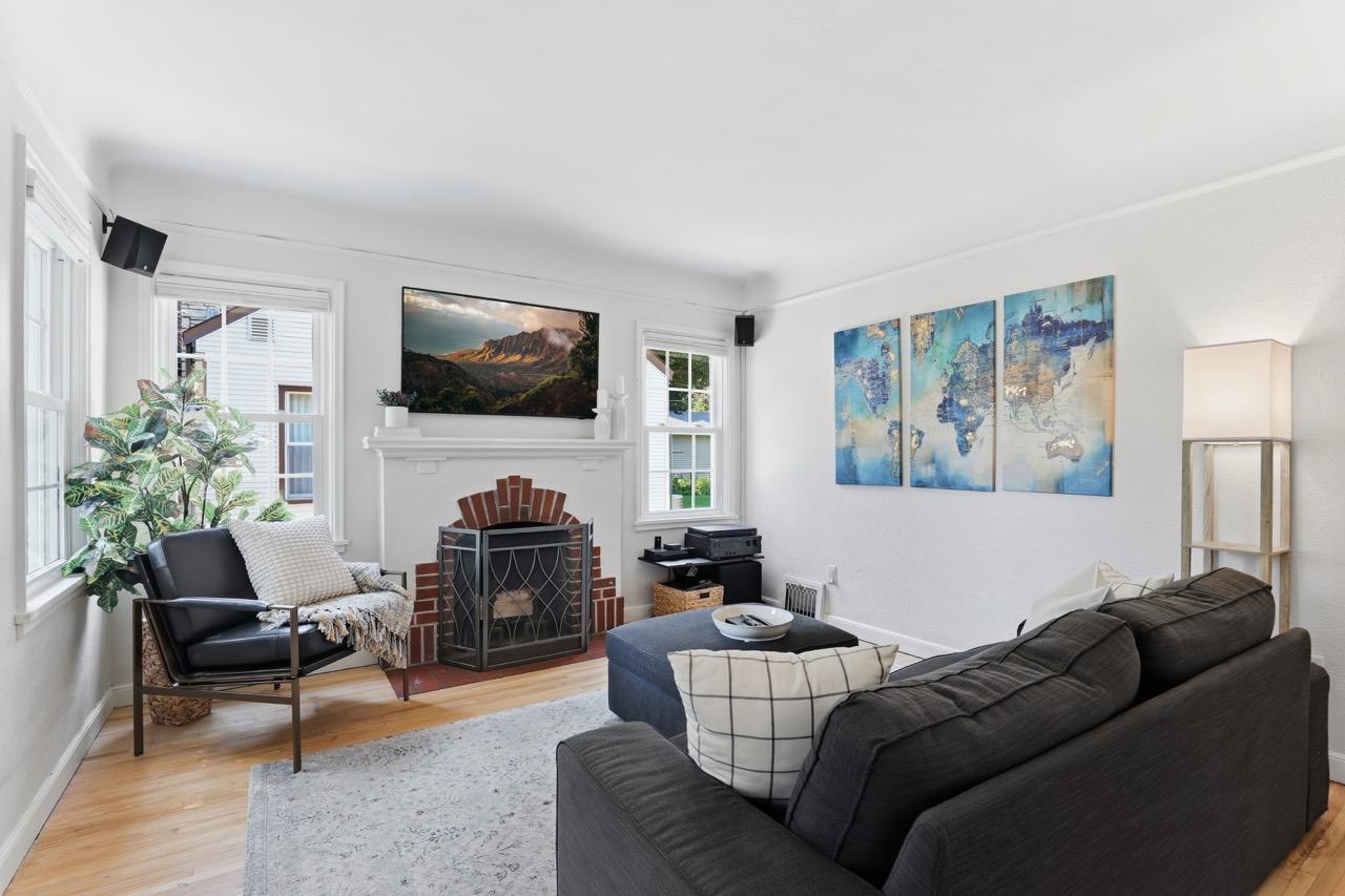 Original Brick Fireplace with tastefully integrated 5.1 Surround sound system for immersive movie expeirence with the Samsung TheFrame Smart TV.