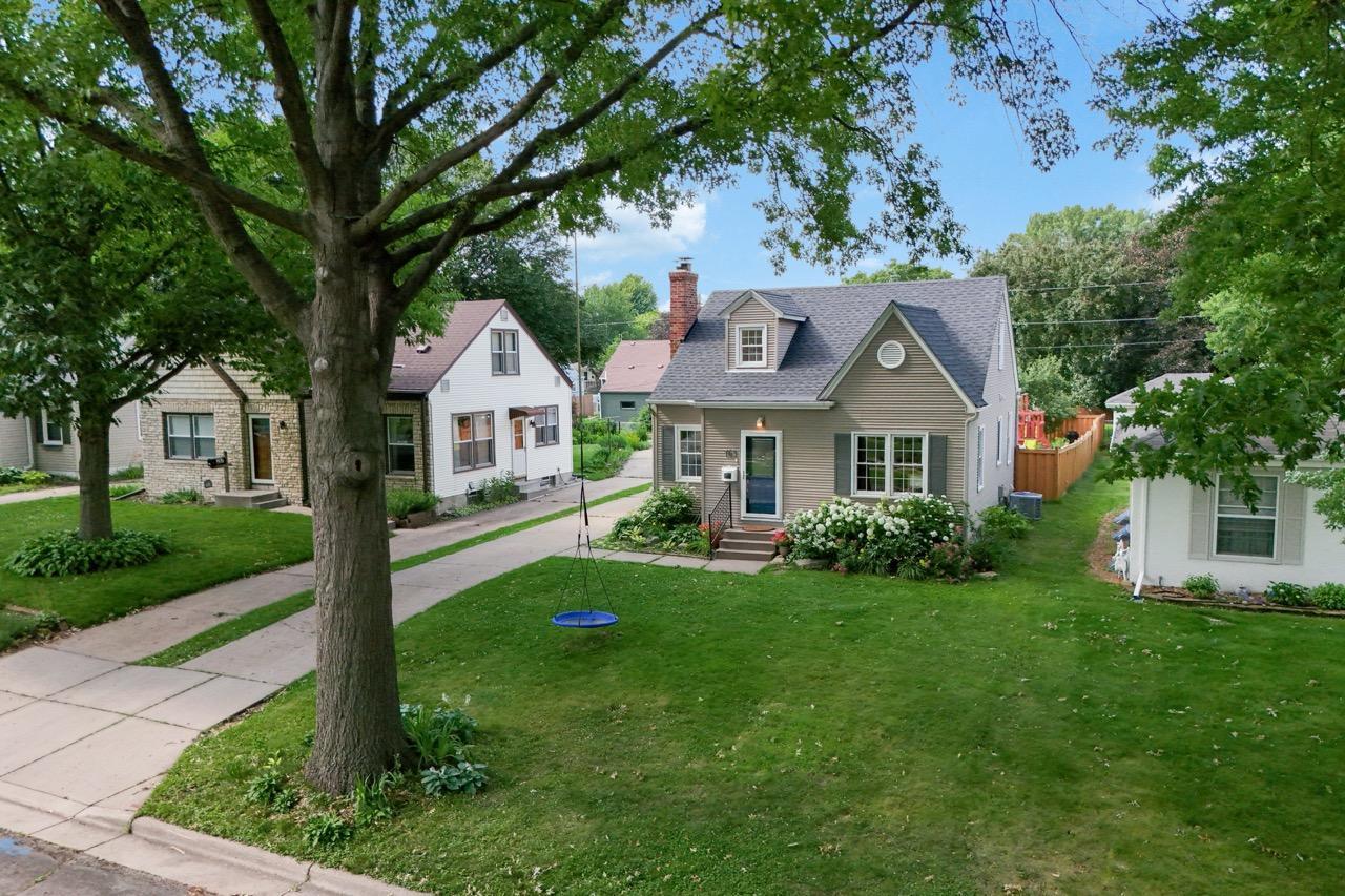 Elevated view of property from the southeast showing high tree swing hanging from the boulevard tree.
