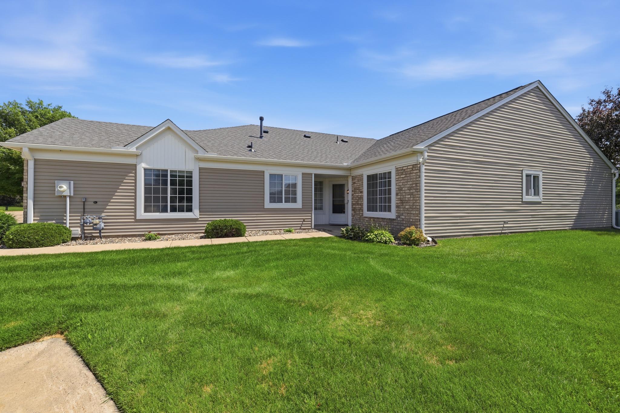 Four nearby guest parking spaces offer convenient and easy access for visiting family and friends.