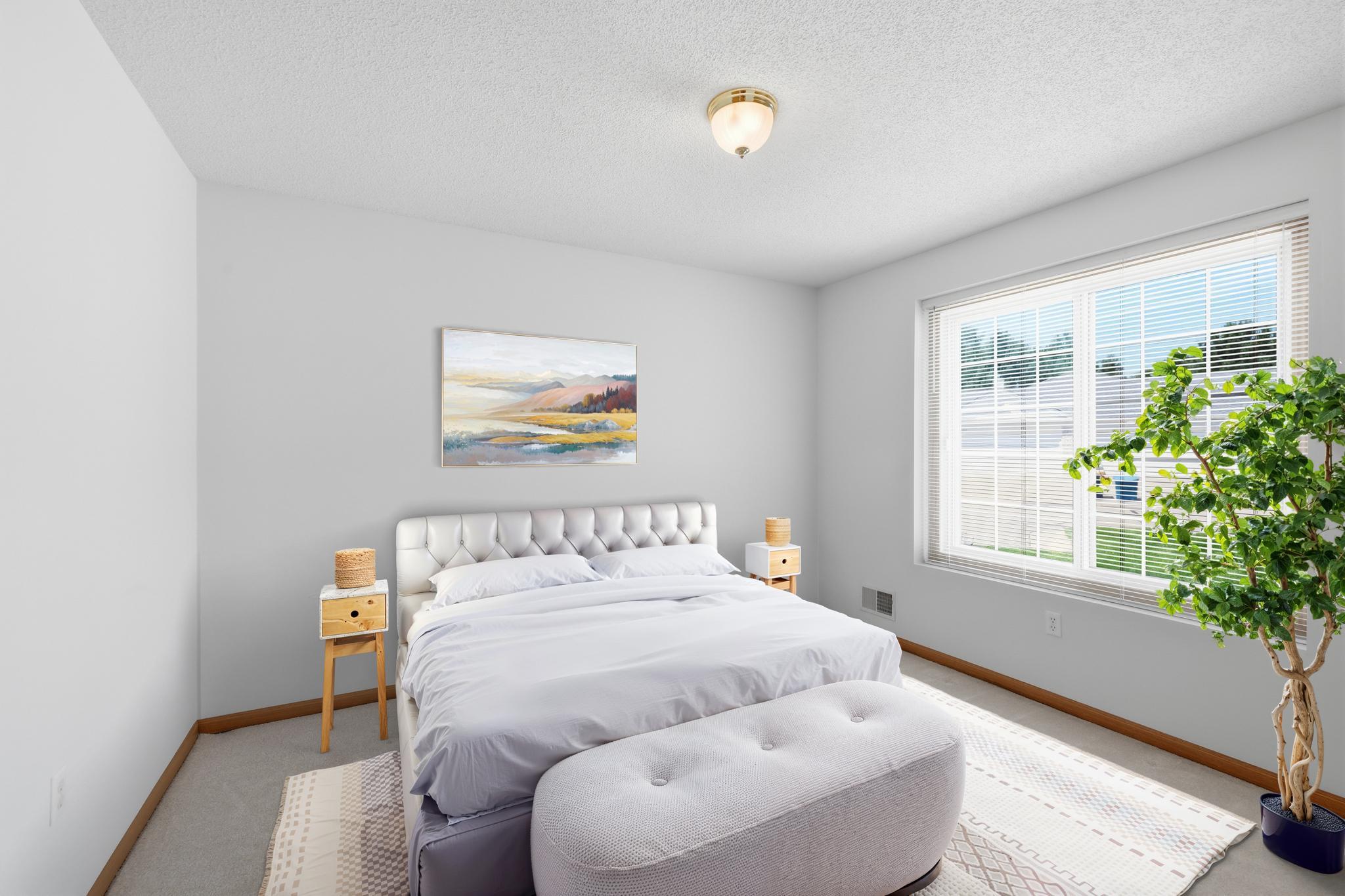 Virtually staged Bedroom 2, showcasing its versatility—this space can easily function as a comfortable guest room or a private home office.