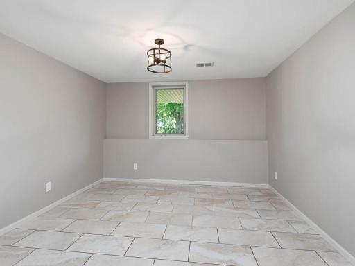 Finished LL bedroom 4 provides flexible accommodations for guests, extended stays, or multigenerational living.