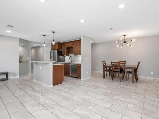 LL offers an open second kitchen and dining area designed for flexible in-law-style living.