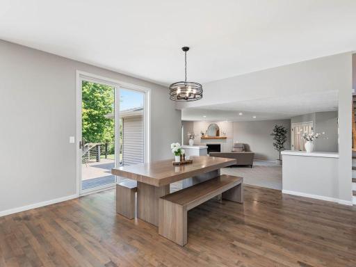 Open-concept dining area connects comfortably to the kitchen and spacious main-level living room.