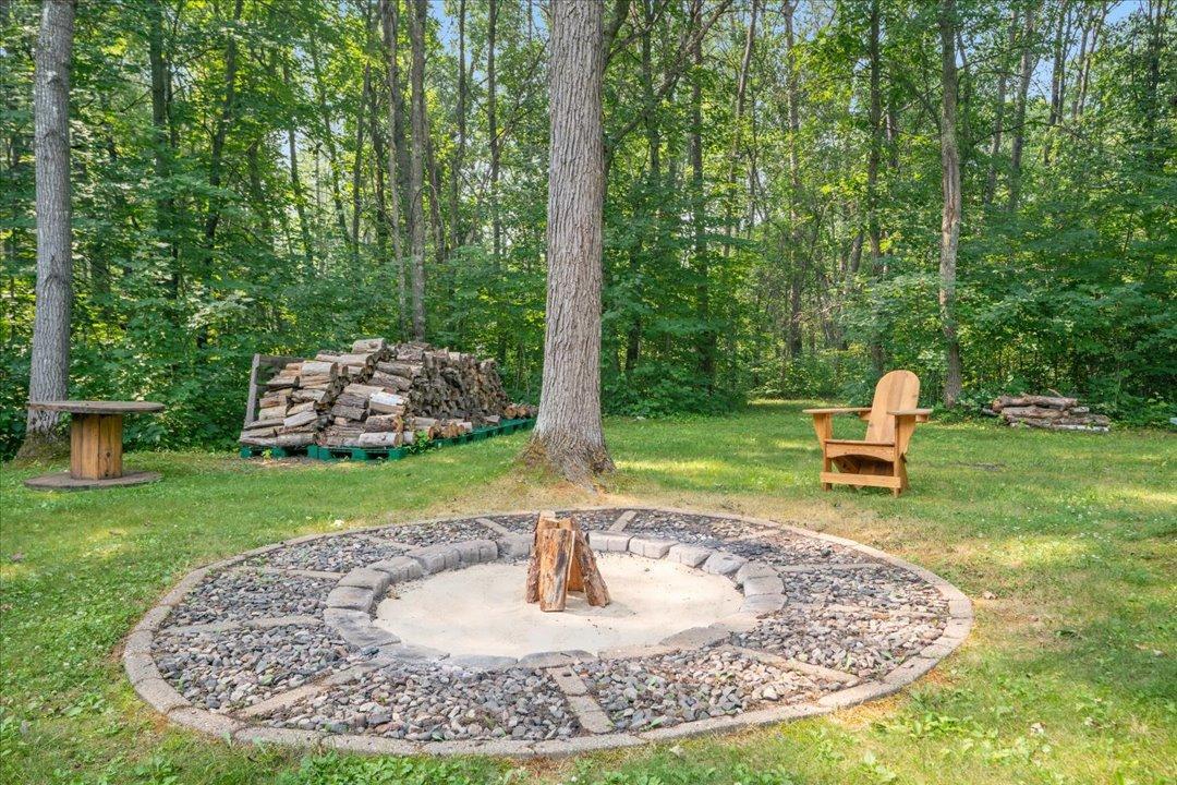 Custom Fire Pit on the South Side of Home / Access to the Groomed Walking Trails