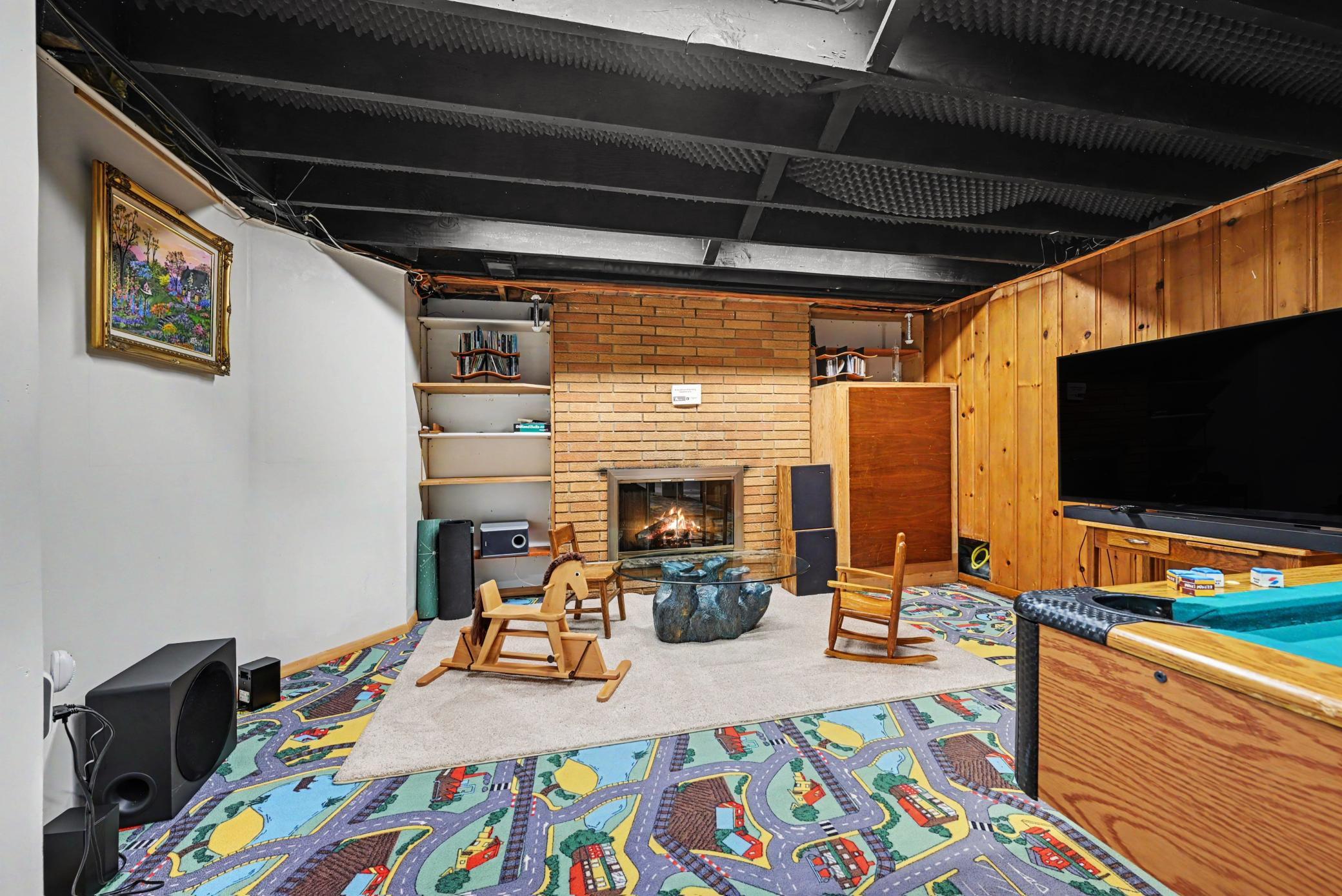 Family Room w/wood fireplace.