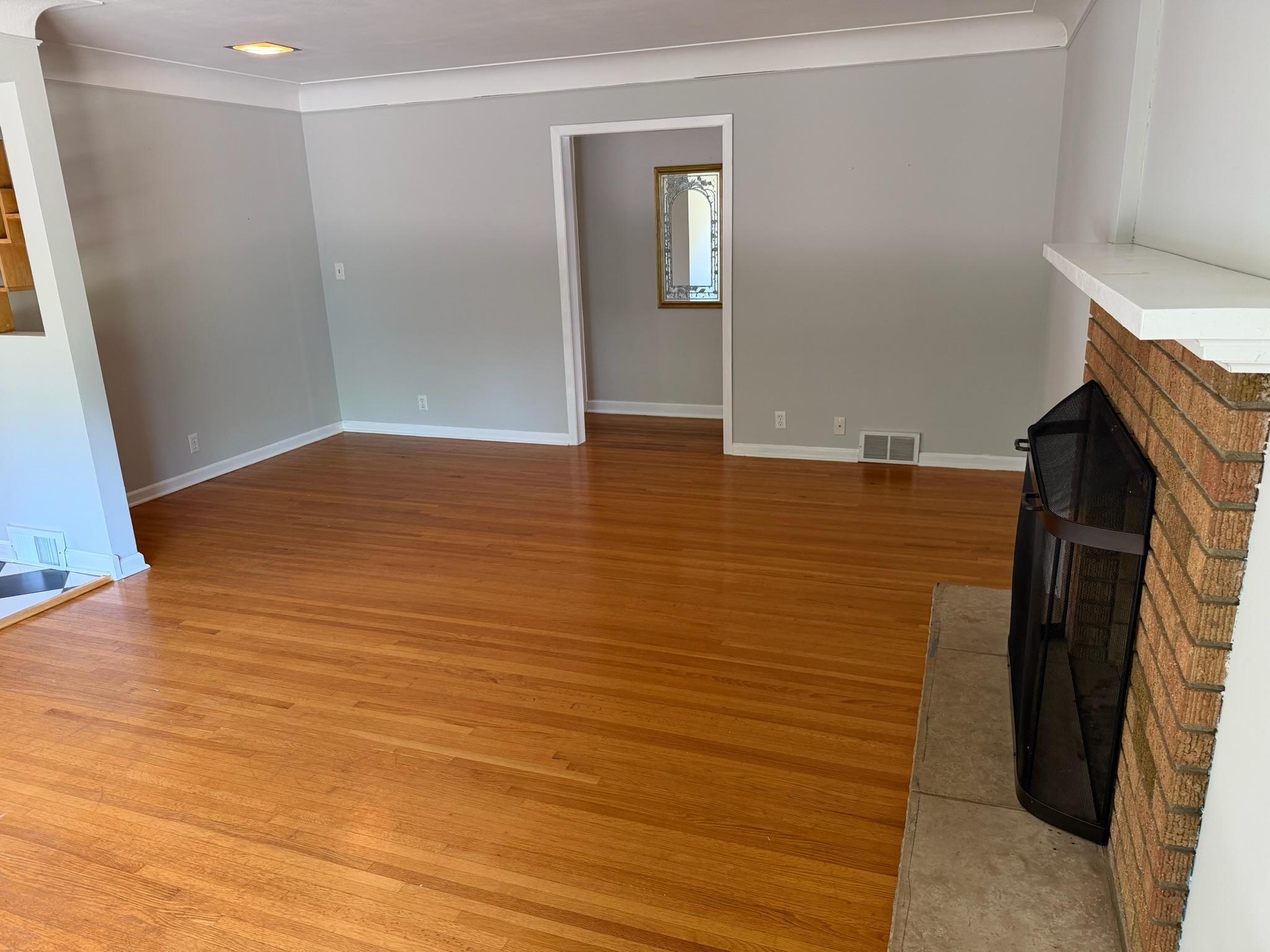 LIVING ROOM w/ door to hallway
