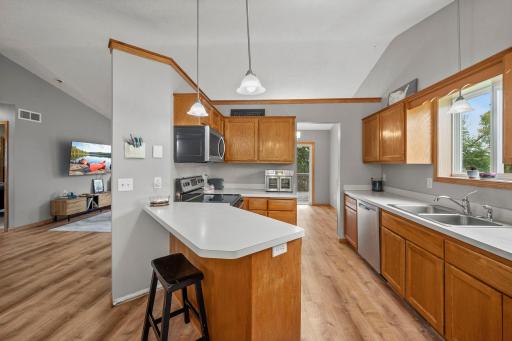 Bright kitchen with functional island, great for prep and gathering!