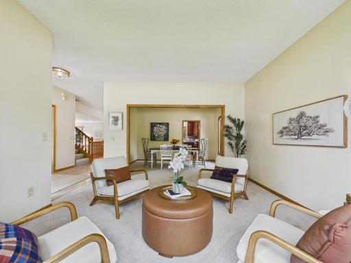Living sitting room opens into dining area