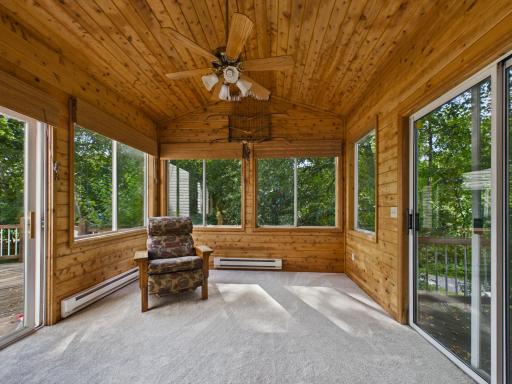 sunroom with acccess to two decks