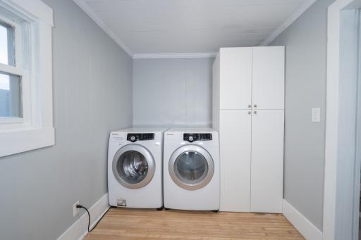 34-Upper level Bedroom #4 currently used as laundry room. Washer, dryer & cabinet stay.