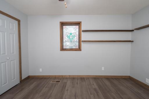 17-Bedroom #1 - Main Floor hardwood floor.jpg