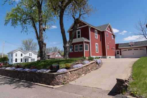 Front & southside of property with driveway on the right.