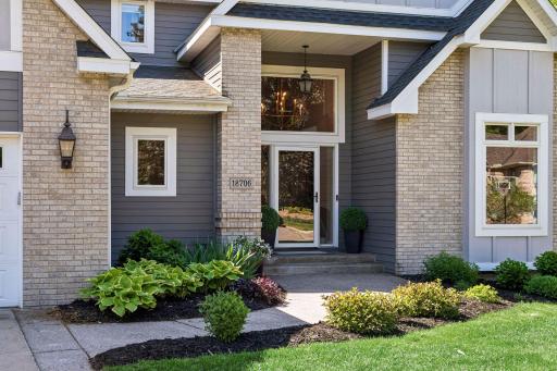 Welcome to 18706 Kanabec Court, a home designed to capture the beauty of Lake Marion from every level.