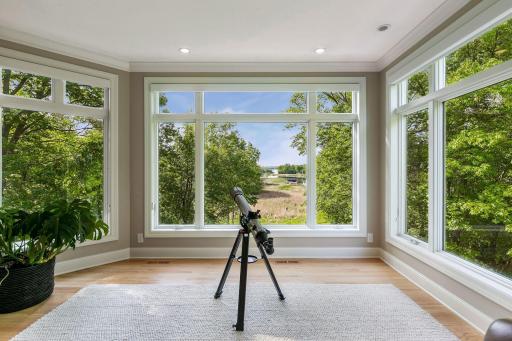 Winter, spring, summer, or fall, this favorite room offers windows for days, stunning lake views, endless bird watching, and starry nights you'll never forget.