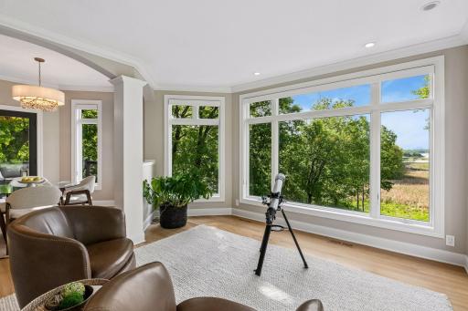 Winter, spring, summer, or fall, this favorite room offers windows for days, stunning lake views, endless bird watching, and starry nights you'll never forget.