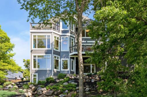 Enjoy breathtaking lake views from all three levels, with a hidden workshop tucked below for projects, storage, or hobbies.